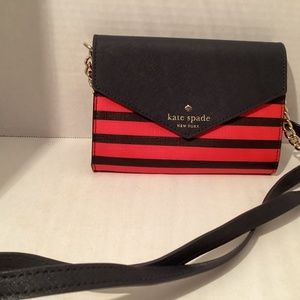 Kate spade cross body navy and red bag with gold chain on straps